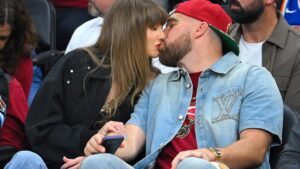 Travis Kelce Honors Taylor Swift With Romantic Movie Poster at L.A. Live Show