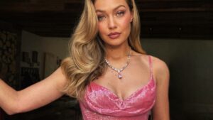 Gigi Hadid Is Pretty in Pink for BFF Taylor Swift's Wedding to Travis Kelce